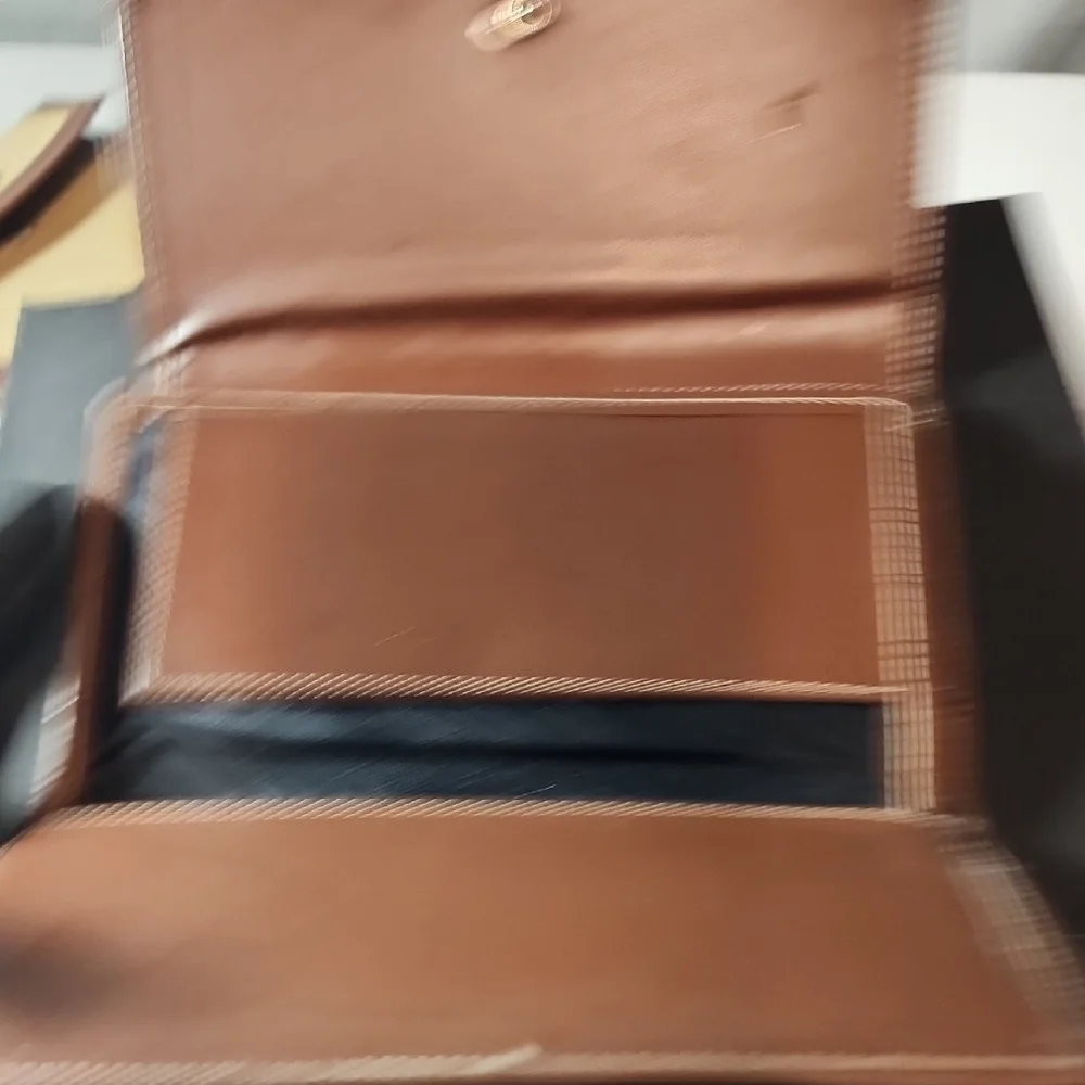 Dooney & Bourke Woven Tan and Brown Clutch